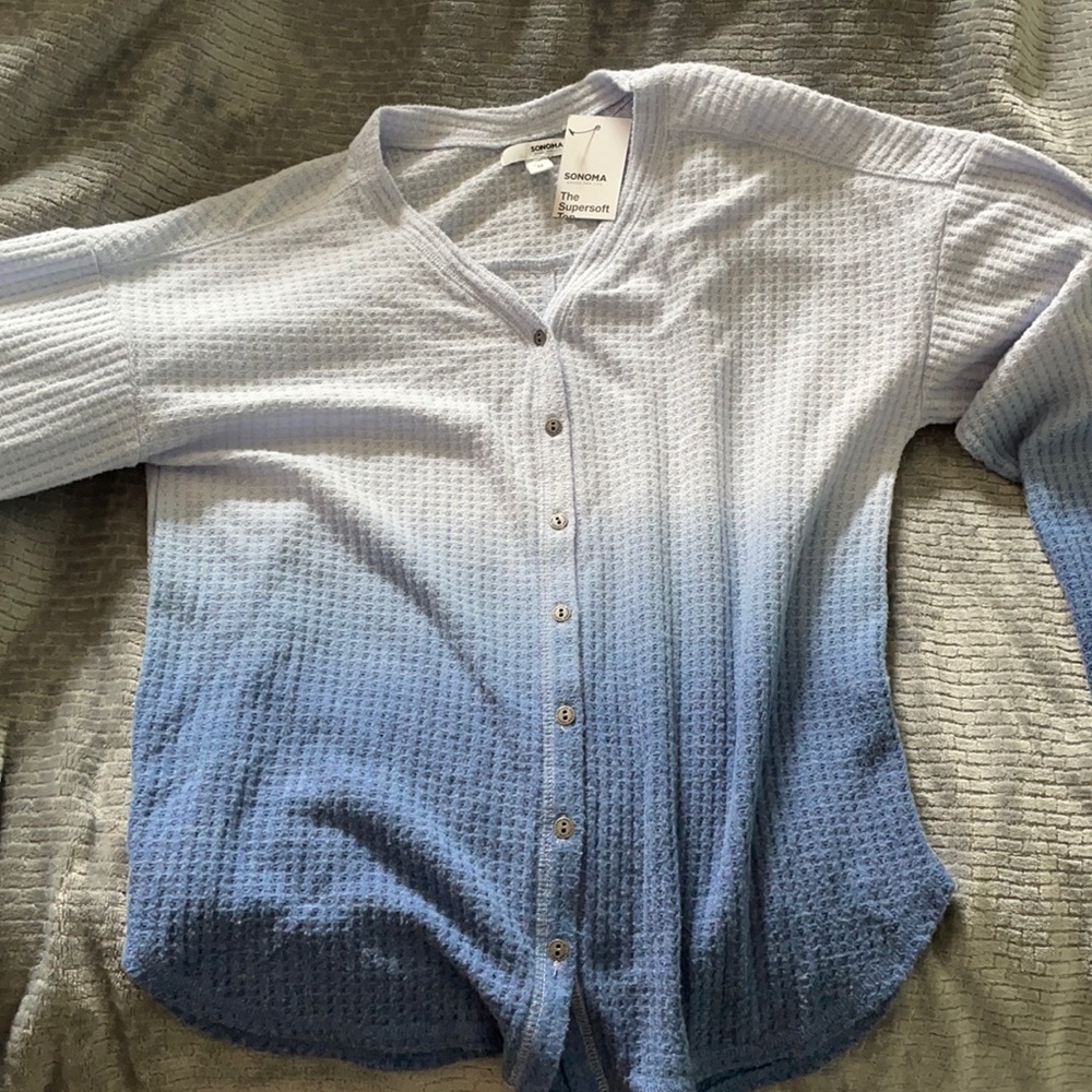 Never worn, blue long sleeve